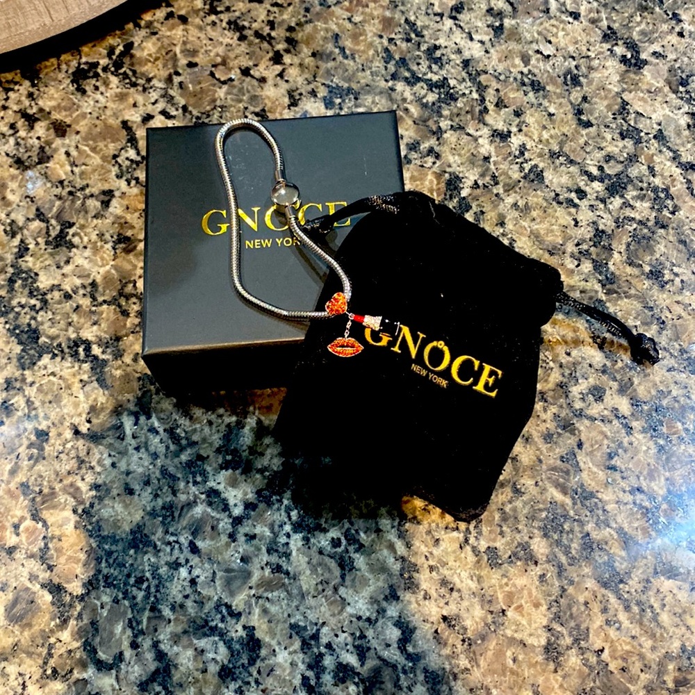 Gnoce New York Silver charm bracelet silver lipstick/lip charms. Verification!